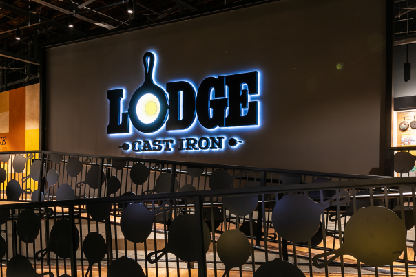 Interior Lodge Cast Iron Museum Sign and railing made out of skillets